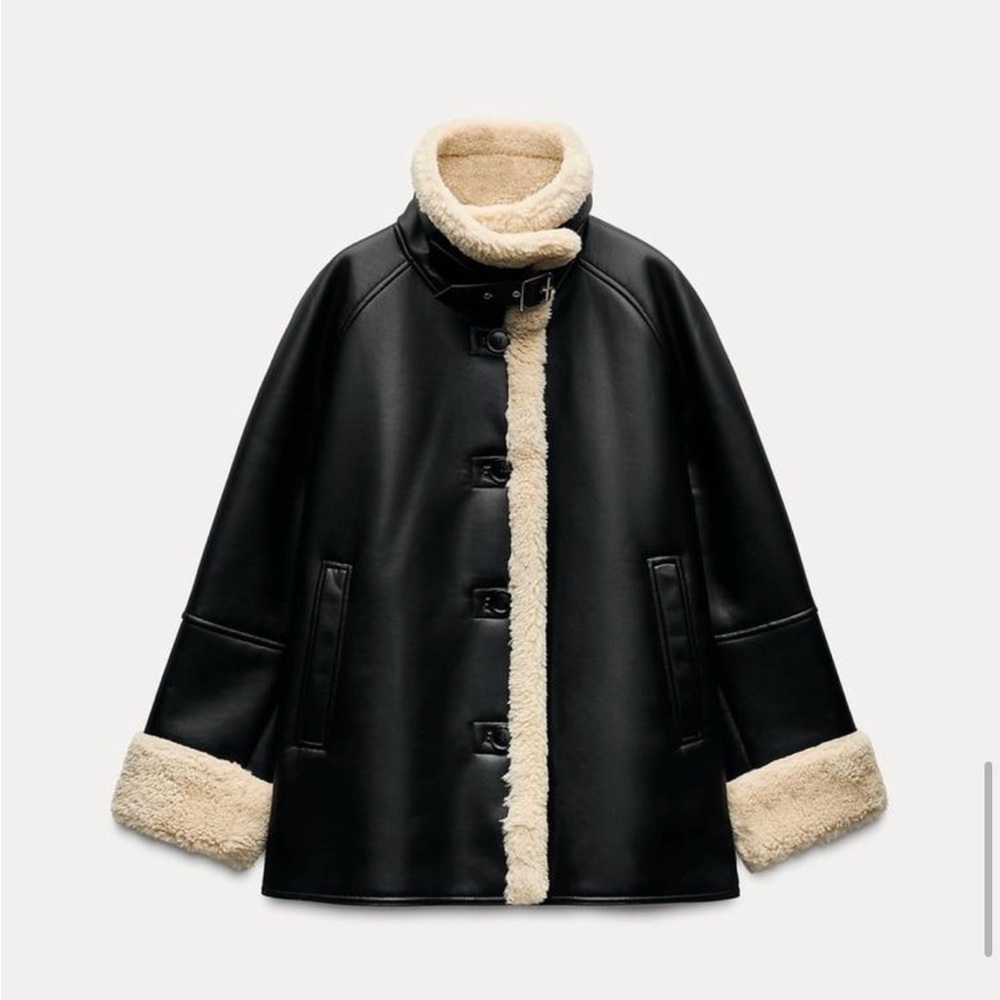 Elegant Black Coat with Cream Accents